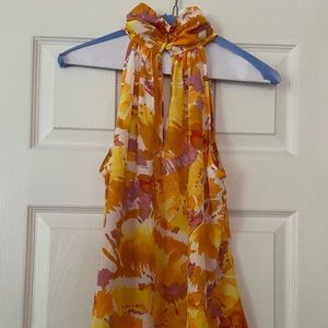 Top-sleeveless high button neckline. SZ M. Flowy fit & gorgeous colors. NWT